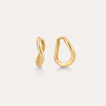 The 14K Recycled Solid Gold Twisted Huggie Earrings feature smooth, wavy, organic shapes and an asymmetrical design. These mini hoops are crafted from recycled gold and displayed on a plain light background.