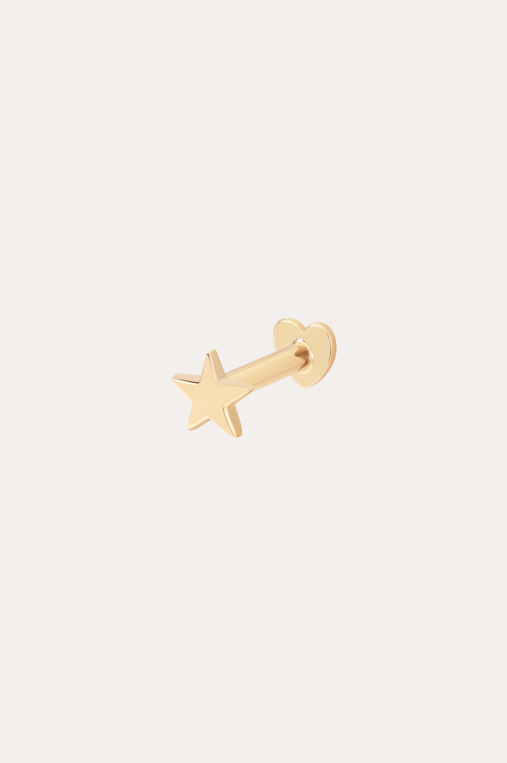 The 14K Solid Yellow Gold Mini Star Flat Back Stud features a delicate star-shaped front and round back, crafted in 14K yellow gold and beautifully displayed on a plain white background.