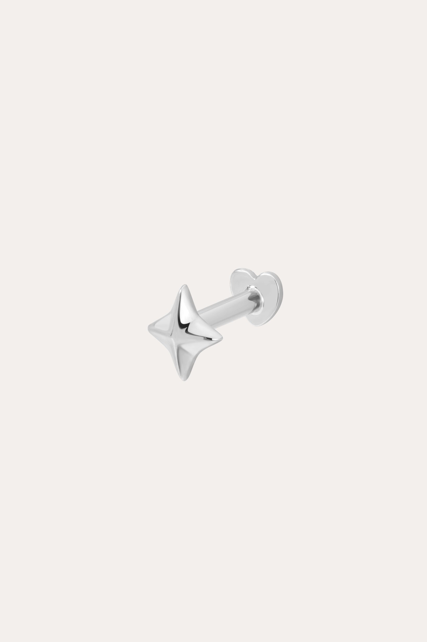 The 14K Solid White Gold Four Point Star Flat Back Stud features a shiny, four-pointed star design in 14K white gold with a comfortable flat back—an elegant choice for piercing jewelry.