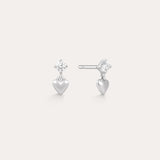 The Lilian Crystal Heart Studs Earrings in Silver feature a sparkling star-shaped gemstone above a dangling silver heart charm—perfect dainty earrings for any occasion.