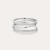 The Nola Pavé Triple Band Ring in Silver features three thin, parallel pavé bands set with sparkling white stones, connected at the sides and displayed on a plain light background.