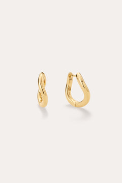 The Nori Twisted Hoop Earrings in Gold, featuring an 18k gold-plated, organically twisted design, are displayed on a plain light background—one shown from the front and one from the side to highlight their fluid curves.