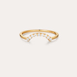 The Reine Rainbow Crystal Ring in Gold features a curved row of small, round crystals set along the top, shown on a simple light background.