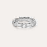The Bamboo Chunky Crystal Ring in Silver is crafted from recycled sterling silver, featuring three sections set with sparkling crystals and a bamboo-inspired design, shown against a plain, light background.