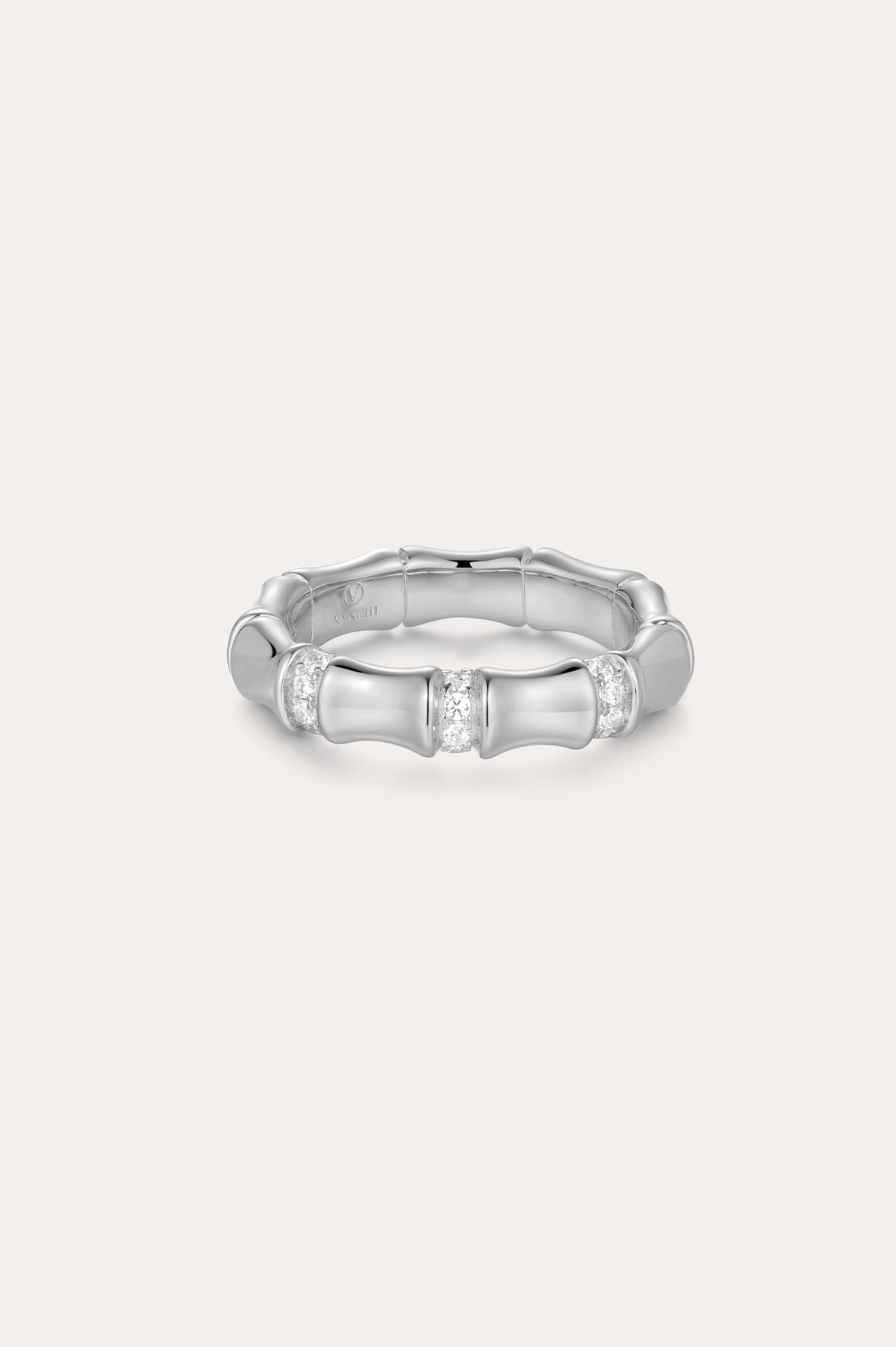 The Bamboo Chunky Crystal Ring in Silver is crafted from recycled sterling silver, featuring three sections set with sparkling crystals and a bamboo-inspired design, shown against a plain, light background.