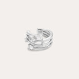 The Vale Crystal Ear Cuff in Silver features three parallel bands accented with five clear, uniquely shaped gemstones, shown against a light background.