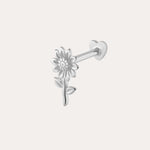 The 14K Solid White Gold Sunflower Flat Back Stud, crafted in 14K white gold and featuring a floral design, makes elegant piercing jewelry and is displayed against a plain light background.