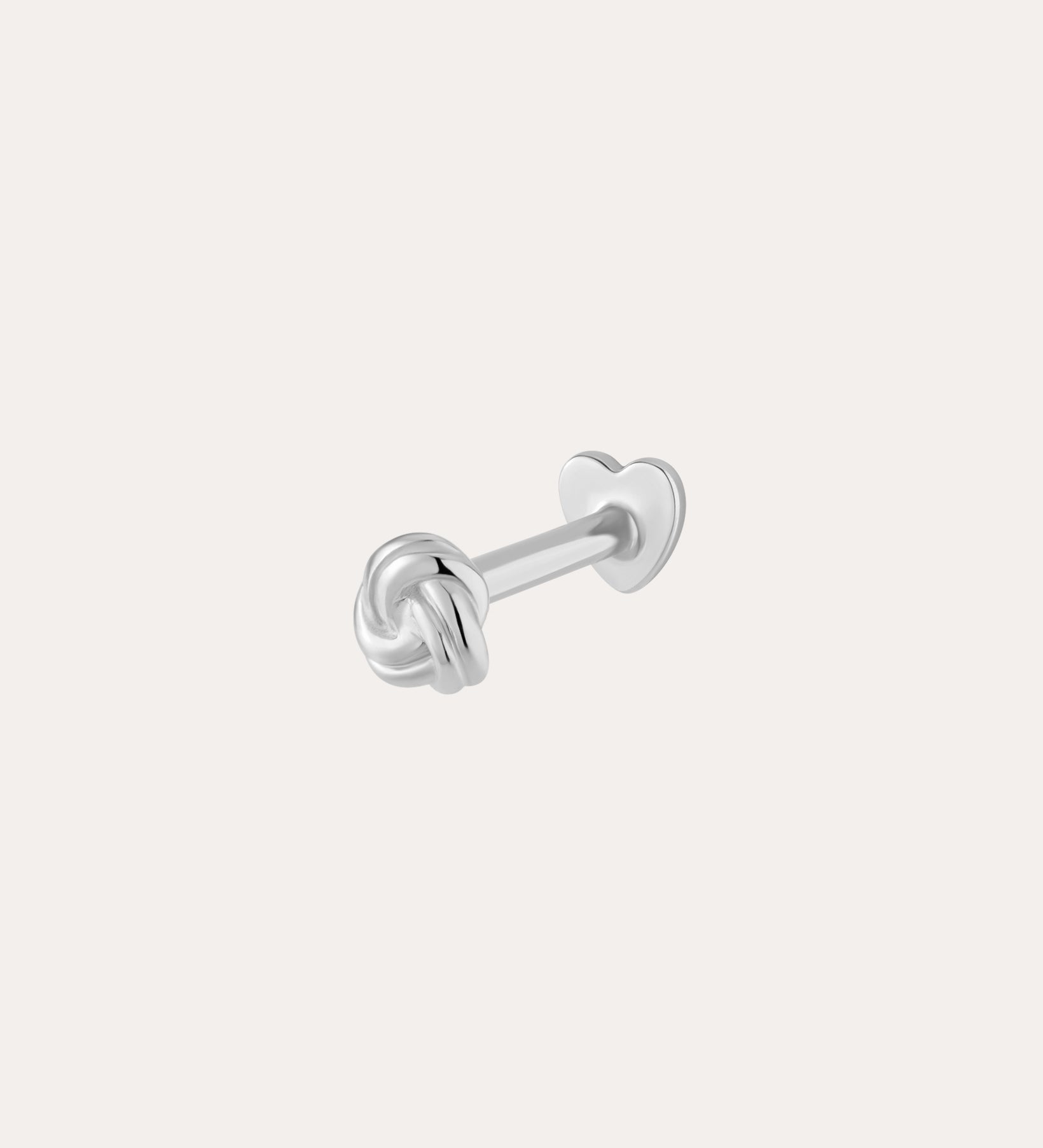 The 14K Solid White Gold Love Knot Flat Back Stud features a knot design and a heart-shaped flat back closure, shown in 14K white gold against a plain light background.