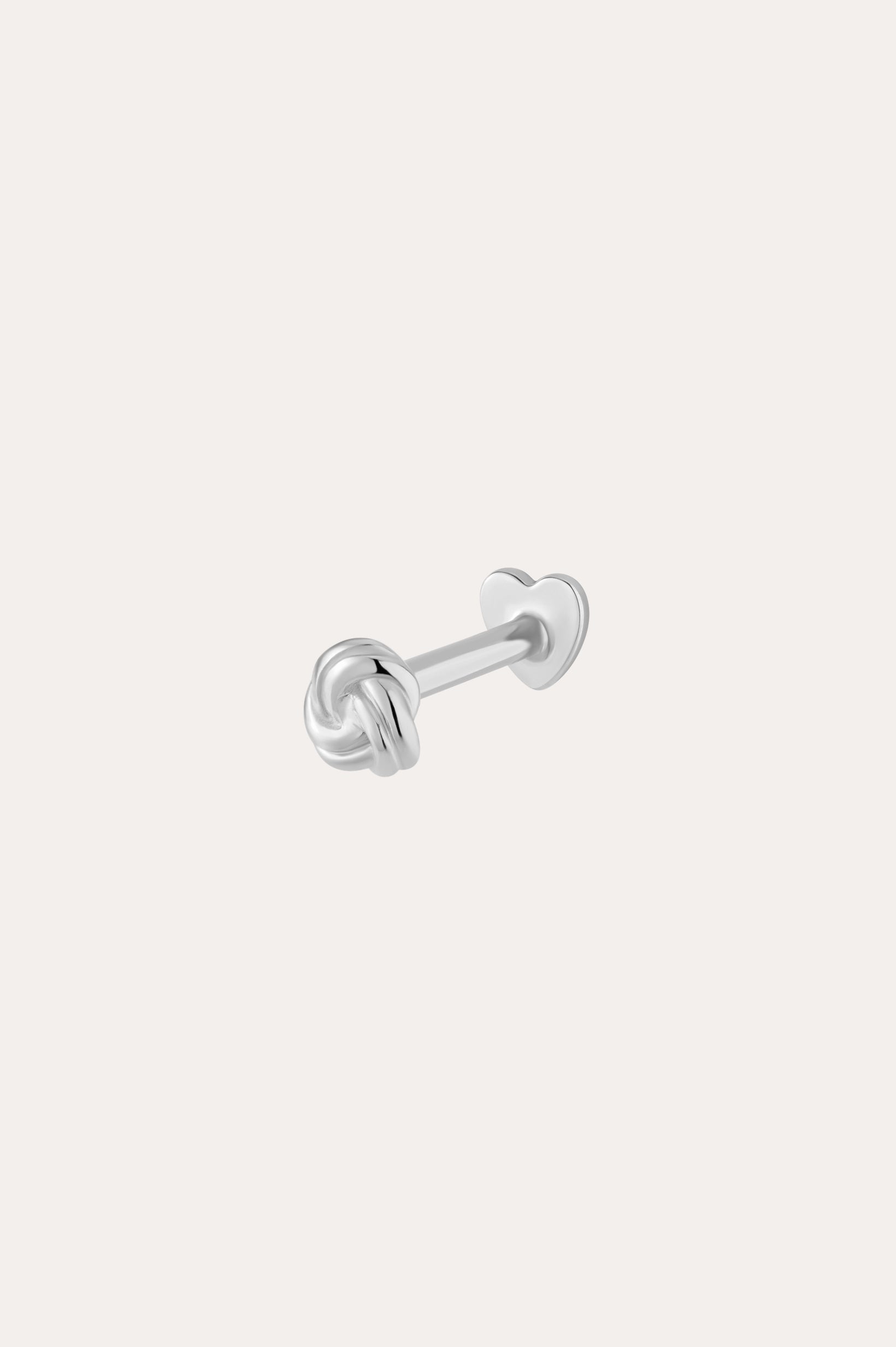 The 14K Solid White Gold Love Knot Flat Back Stud features a knot design and a heart-shaped flat back closure, shown in 14K white gold against a plain light background.