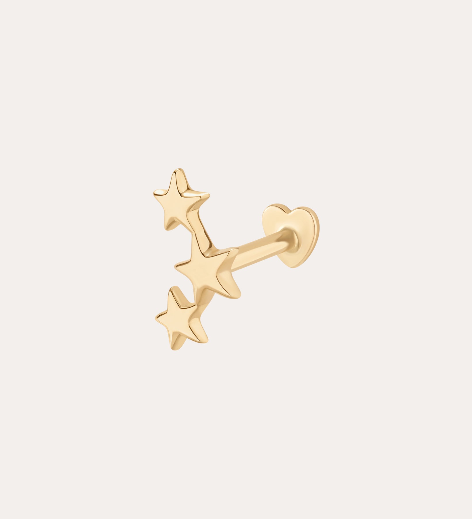 The 14K Solid Yellow Gold Star Cluster Flat Back Stud features three small stars on a straight post with a round, flat back, perfect for helix piercings. Shown in 14K yellow gold on a simple light background.