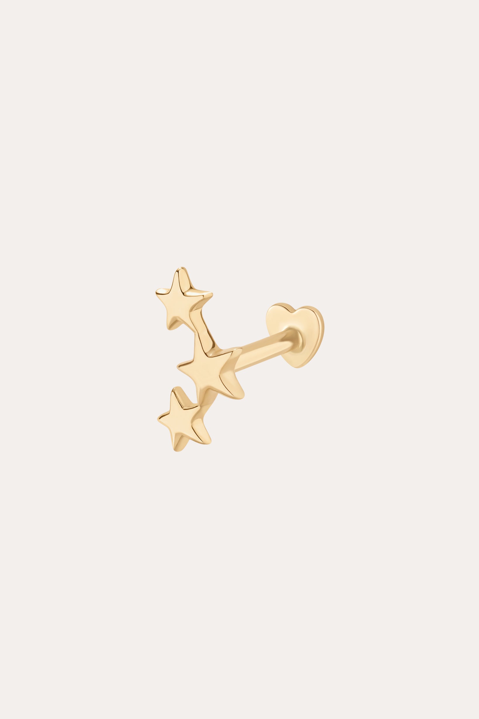 The 14K Solid Yellow Gold Star Cluster Flat Back Stud features three small stars on a straight post with a round, flat back, perfect for helix piercings. Shown in 14K yellow gold on a simple light background.