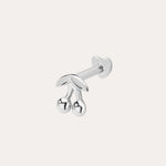 The 14K Solid White Gold Cherry Flat Back Stud, featuring two round cherry fruits and delicate leaves, stands out as elegant body jewelry against a plain light background.