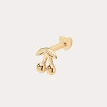 The 14K Solid Yellow Gold Cherry Flat Back Stud features two cherries with leaves and a rounded backing, designed as elegant body jewellery and displayed against a plain light background.