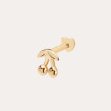 The 14K Solid Yellow Gold Cherry Flat Back Stud features two cherries with leaves and a rounded backing, designed as elegant body jewellery and displayed against a plain light background.