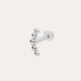 The 14K Solid White Gold Curved Ball Flat Back Stud features six shiny round beads in a curved line, shown on a plain white background—an elegant choice for body jewellery.