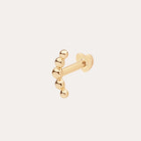 The 14K Solid Yellow Gold Curved Ball Flat Back Stud features six rounded beads in a curved line on a flat back post, ideal for ear stacks. Shown against a simple light background in classic 14K yellow gold color.