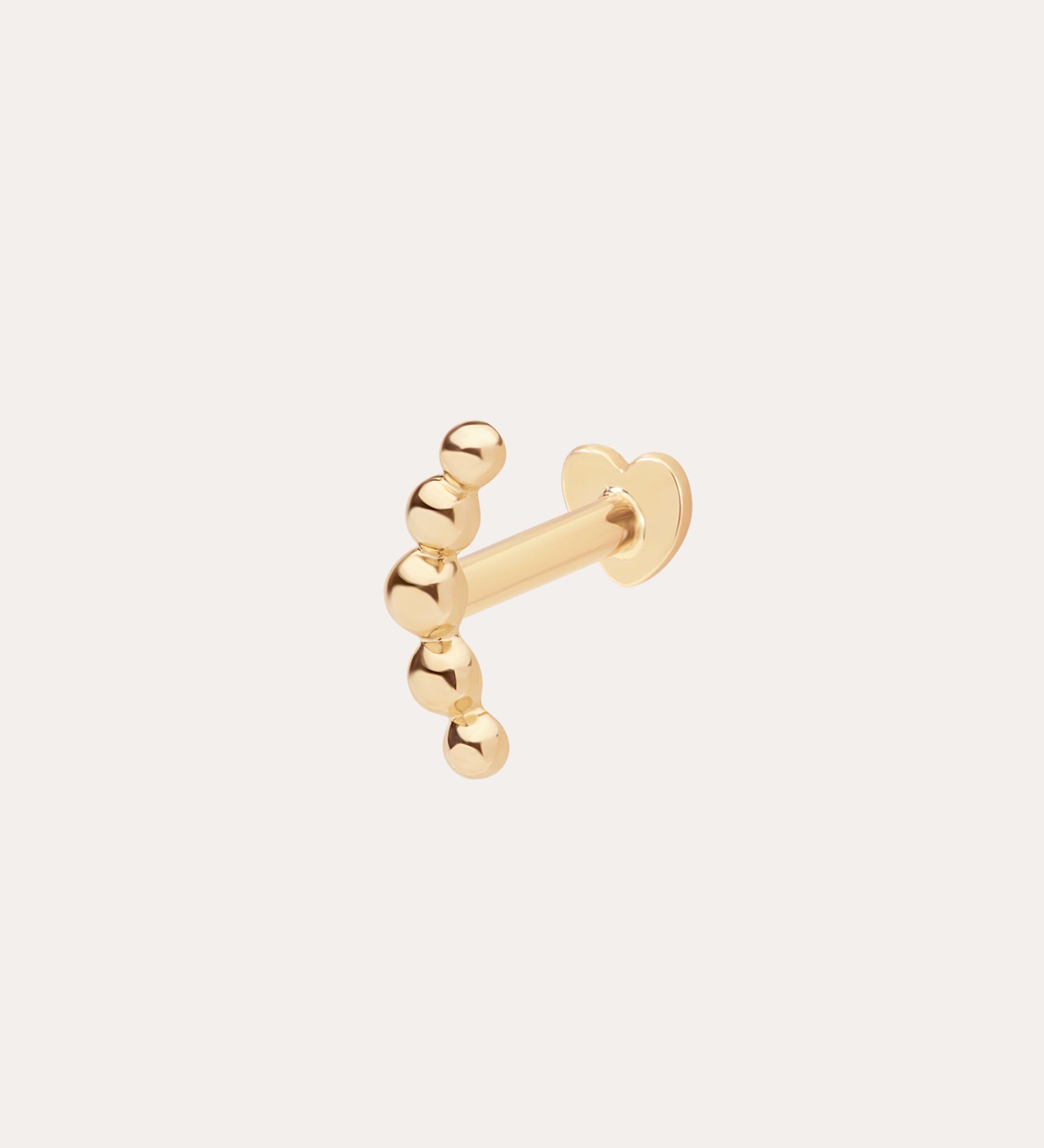 The 14K Solid Yellow Gold Curved Ball Flat Back Stud features six rounded beads in a curved line on a flat back post, ideal for ear stacks. Shown against a simple light background in classic 14K yellow gold color.