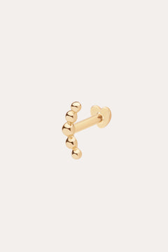 The 14K Solid Yellow Gold Curved Ball Flat Back Stud features six rounded beads in a curved line on a flat back post, ideal for ear stacks. Shown against a simple light background in classic 14K yellow gold color.