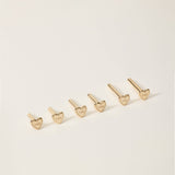 Six titanium studs (16G, 1.2mm) with 5mm labret bars are arranged in a row on a light background—ideal for lobe piercings or adding to your 16G jewelry collection.