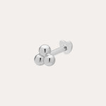 The 14K Solid White Gold Trinity Flat Back Stud features three small round beads in 14K white gold, with a straight post and flat backing for secure, stylish body jewelry.