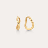 The 14K Recycled Solid Gold Twisted Huggie Earrings feature smooth, wavy, organic shapes and an asymmetrical design. These mini hoops are crafted from recycled gold and displayed on a plain light background.