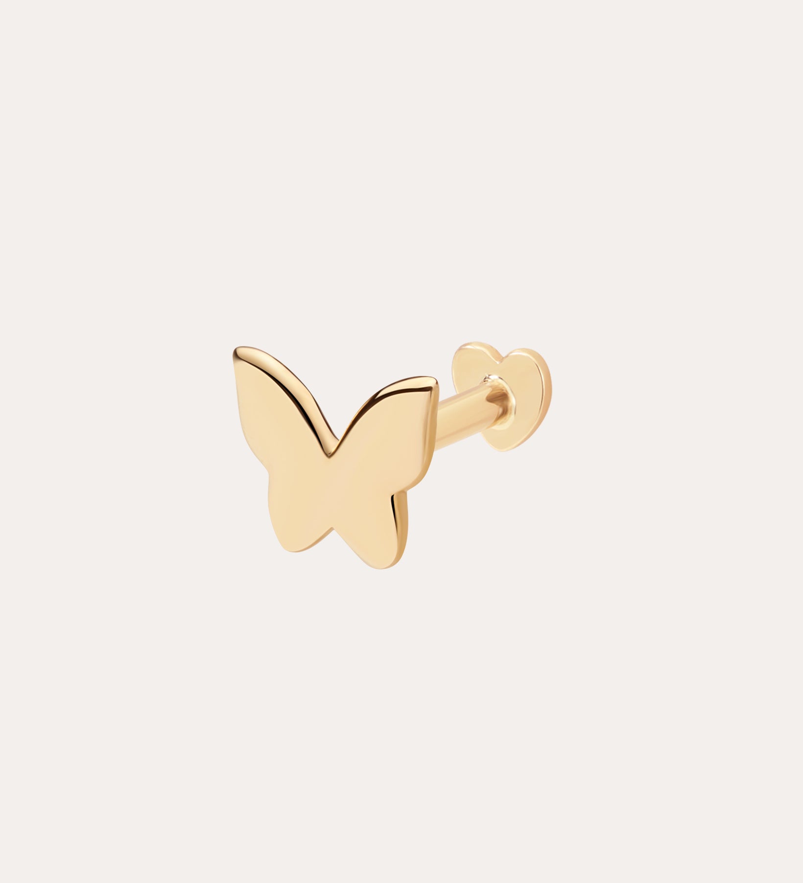 The 14K Solid Yellow Gold Butterfly Flat Back Stud, crafted in 14K yellow gold, is a delicate butterfly-shaped earring shown against a plain light background—a refined piece of body jewelry.