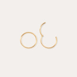 Two 14K Solid Yellow Gold 20G Mini Clicker hoop earrings are shown on a plain white background; one earring is fully closed and the other is partially open.