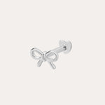 The 14K Solid White Gold Bow Tie Flat Back Stud, in 14K white gold, features a delicate bow front and heart-shaped flat back, shown on a plain white background.