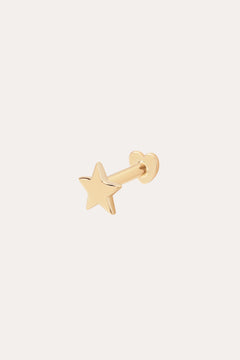 The 14K Solid Yellow Gold Star Flat Back Stud features a five-pointed star design in gleaming 14K yellow gold, making it a striking celestial ear accessory against any plain, light background.