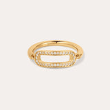 The Heidi Moissanite Paperclip Ring in 18k Gold Plated features an elongated oval open center outlined with sparkling moissanite stones, set against a plain light background. Stackable design enhances its elegant appeal.