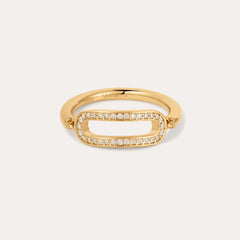 The Heidi Moissanite Paperclip Ring in 18k Gold Plated features an elongated oval open center outlined with sparkling moissanite stones, set against a plain light background. Stackable design enhances its elegant appeal.