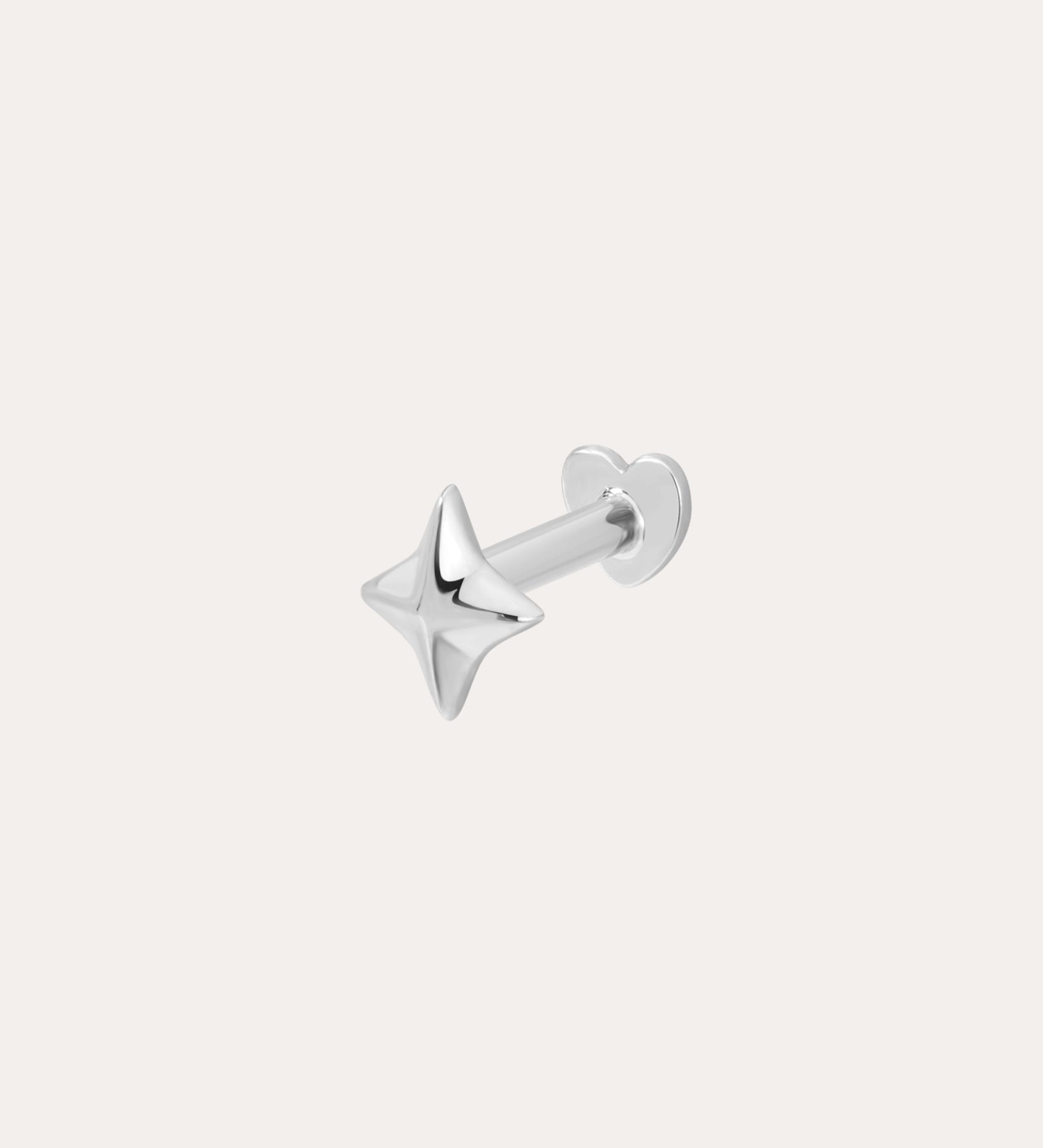 The 14K Solid White Gold Four Point Star Flat Back Stud features a shiny, four-pointed star design in 14K white gold with a comfortable flat back—an elegant choice for piercing jewelry.