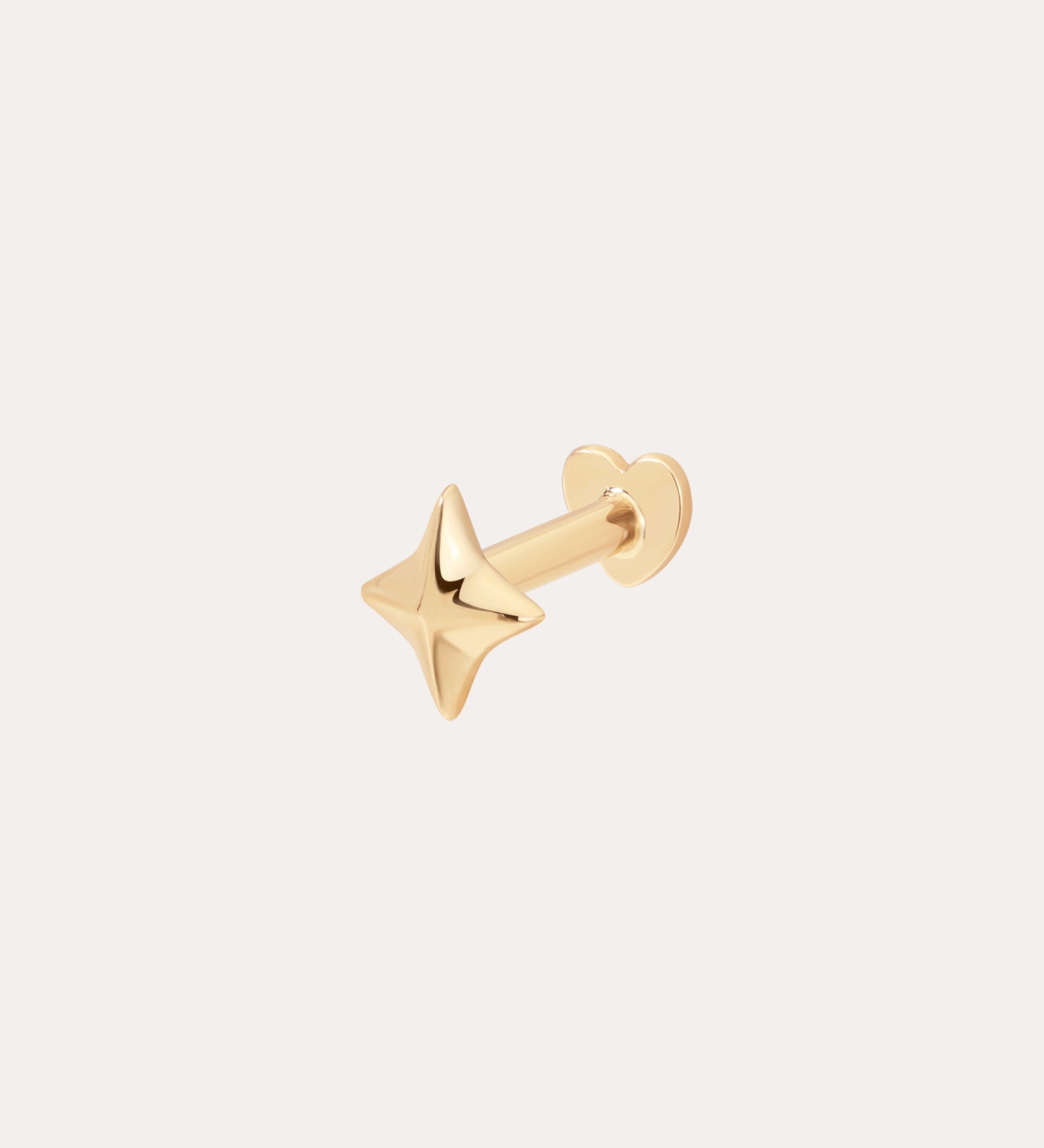 The 14K Solid Yellow Gold Four Point Star Flat Back Stud features a shiny star-shaped design and simple round backing, crafted in 14K yellow gold and photographed against a plain, light background.