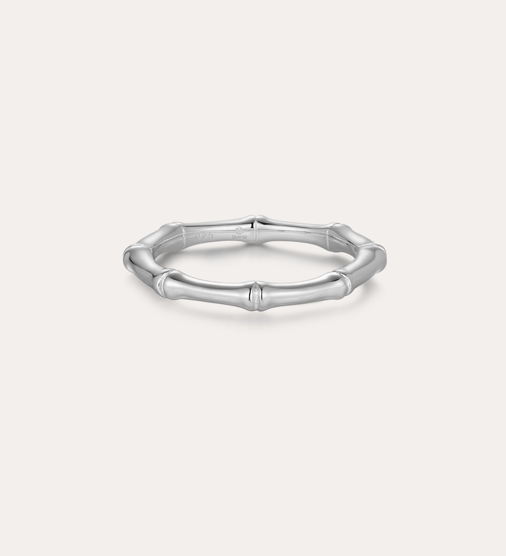 The Bamboo Ring in Silver is a slender band crafted from recycled sterling silver, featuring subtle joint details and showcased on a plain light background.