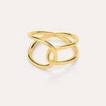 The Ayla Link Ring in Gold features an open, intertwined double-band design for a modern, elegant look, showcased against a plain, light background.