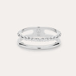 The Molten Double Band Ring in Sterling Silver features two parallel bands—one smooth, one twisted rope—connected at the sides. Stamped 925 and with a geometric logo, it's perfect for everyday wear on a light background.