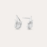 Flame Stud Earrings in Silver, crafted in sterling silver and shaped like stylized flames, are shown on a plain light background with one front view and one side view—ideal for fans of modern jewellery.