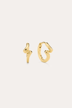 The image shows two small 18k gold plated stud earrings—one a lightning bolt, the other a looping squiggle—styled with Ribbon Twist Huggies in Gold, all set against an off-white background for a chic presentation.