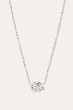 The Defender Evil Eye Necklace in Sterling Silver features an eye-shaped pendant with a central gemstone and four dangling gems, combining elegance and protective charm, shown against a plain white background.