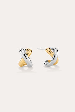 Mia Two-tone Mixed Metal Hoops in 18k gold plating feature an intertwined gold and silver design, shown on a light background—ideal for everyday wear.