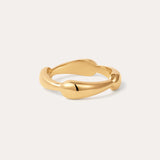The Colette Link Droop Ring in Gold, featuring a wavy, organic design, is displayed against a simple, light background.