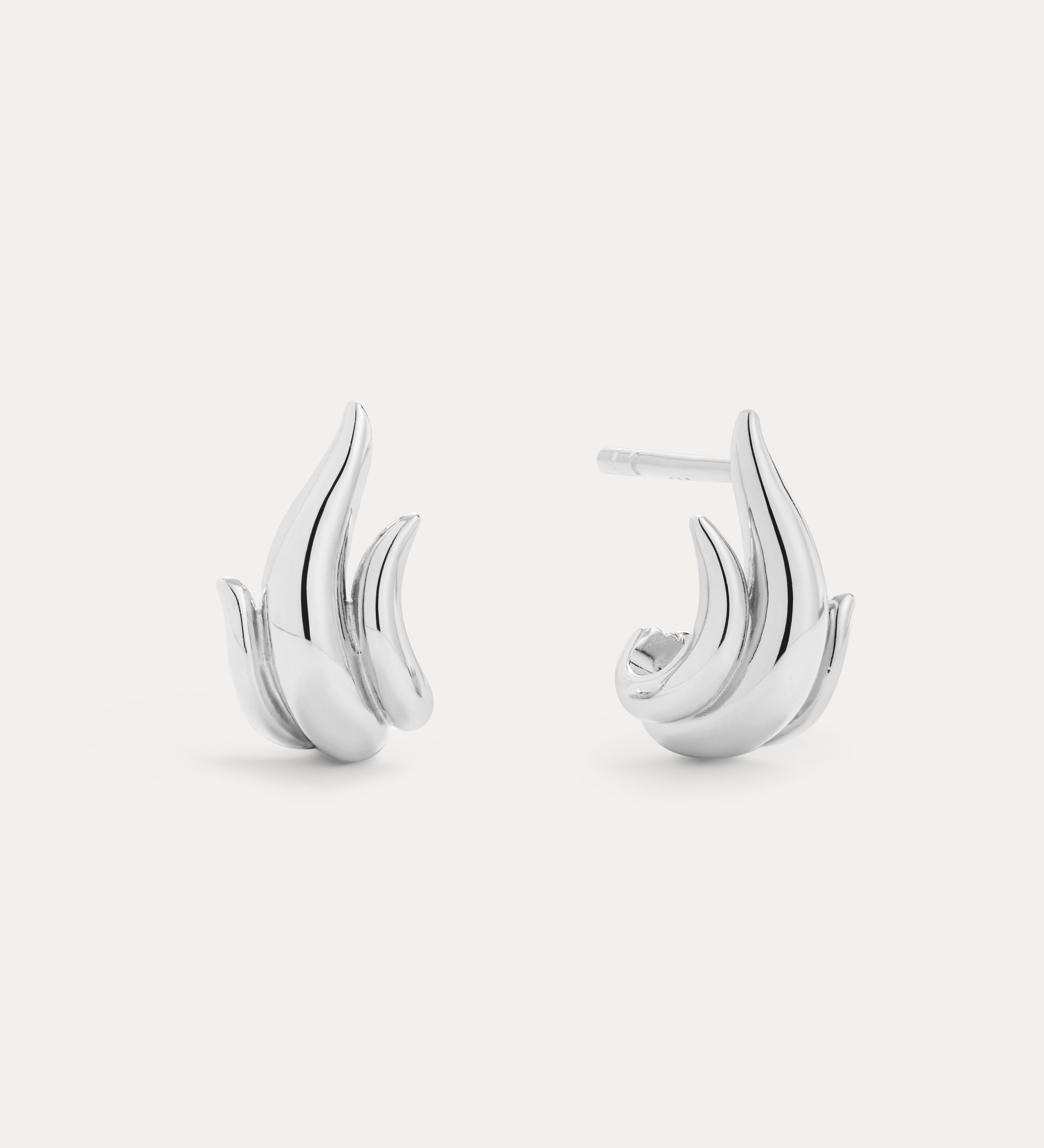 Flame Stud Earrings in Silver, crafted from sterling silver with a smooth, curved flame design. Ideal for modern jewellery lovers and shown on a plain white background.