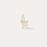 The Flora Barbell Stud in Gold showcases two marquise-cut clear gemstones set in a V shape, ideal as cubic zirconia earrings or for helix piercings, displayed against a plain off-white background.
