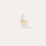 The Flora Barbell Stud in Gold showcases two marquise-cut clear gemstones set in a V shape, ideal as cubic zirconia earrings or for helix piercings, displayed against a plain off-white background.