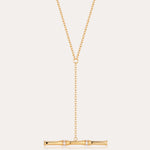 The Bamboo Chain Y-Bar Lariat Necklace in Gold features a delicate Y-shaped chain ending in a horizontal gold bar, accented with sparkling gemstones.