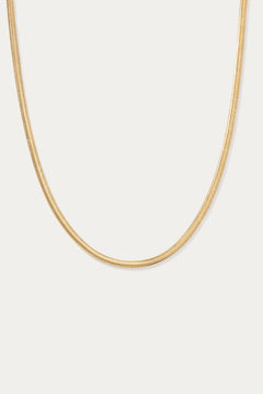 The Estelle Herringbone Chain Necklace in Gold is shown against a plain white background.