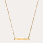 The Viva La Vida Bar Chain Necklace in Gold features an oval horizontal pendant engraved with VIVA LA VIDA on an adjustable delicate figaro chain for the perfect fit.