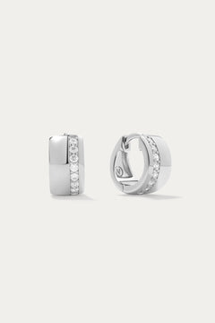 Juni Pavé Chunky Hoop Earrings in Silver: Sterling silver hoops with a vertical row of sparkling diamonds, shown against a plain white background.