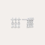 The Lexi Crystal Studs Earrings in Silver showcase three vertical rows of sparkling cubic zirconia in a geometric design, displayed on a neutral background.