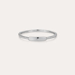 The Lya Horizontal Bar Stacking Ring in Silver features a smooth, polished rectangular center plate and twisted bands on each side—ideal for stacking—and is shown against a plain white background.